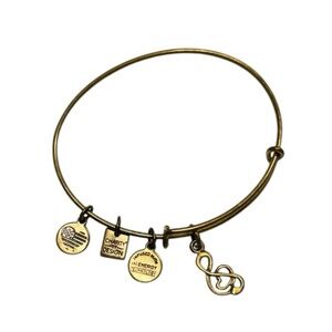 Alex and Ani gold finish treble cleft style bracelet in great condition!